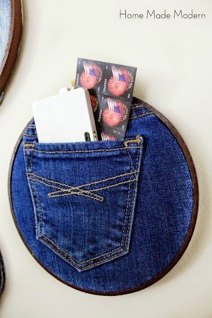 Denim-Pocket-Organizers-as-one-of-the-budget-friendly-recycled-decor-ideas.