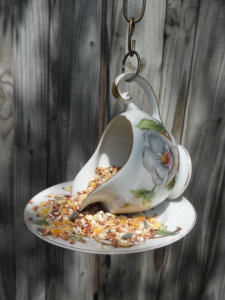 Teacup-Bird-Feeders-as-one-of-the-budget-friendly-decor-ideas